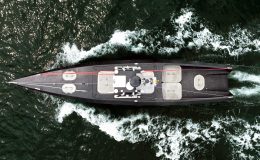 Aerial view of the Oceanus12 autonomous surface vessel underway at sea, showcasing its uncrewed design and advanced AI-powered maritime autonomy platform.