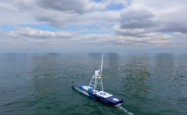 Autonomous surface vessel at sea demonstrating AI route planning and intelligent navigation